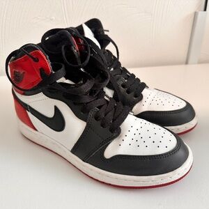 Nike Black and White Sneakers with Red Details